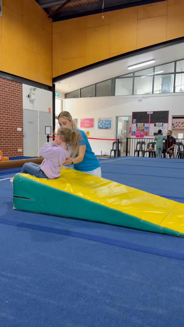 Backward rolls with Coach Ava and that smile says it...