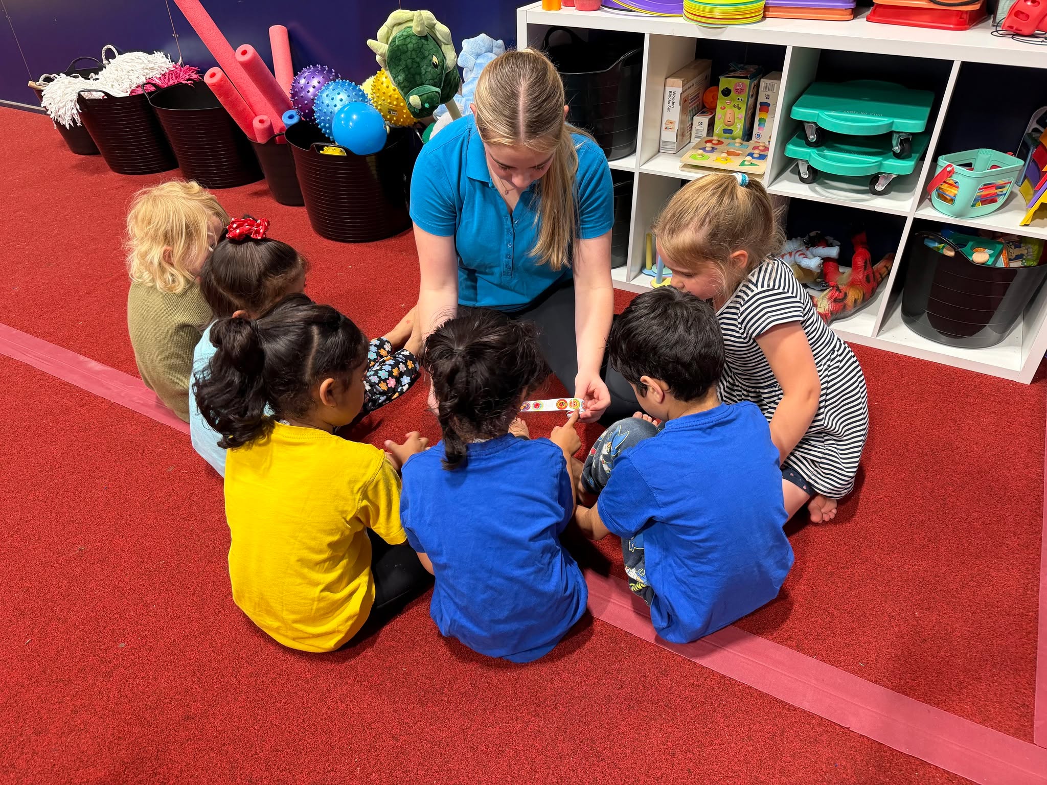 Choosing a sticker with coach Melanie at the end of...